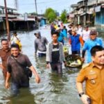 Jokowi Datang, Warga Belawan Senang..!! Tanggul Segera Dibangun Atasi Banjir Rob..!!